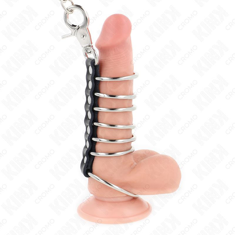 KINK - 7 ANELLI PER PENE IN METALLO DA 3,8 CM A 5 CM COLLEGATI CON CUOIO E CATENA IN METALLO 100 CM