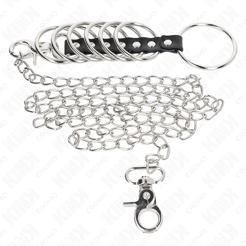 KINK - 7 ANELLI PER PENE IN METALLO DA 3,8 CM A 5 CM COLLEGATI CON CUOIO E CATENA IN METALLO 100 CM